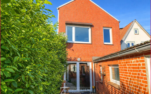 Kleines Stadthaus mit sonnigem Garten**